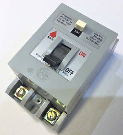 Current operated earth leakage circuit breaker (RCD) of a style in widespread use during the 1980s